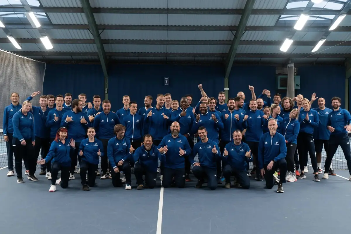 The National Tennis team on an indoor court