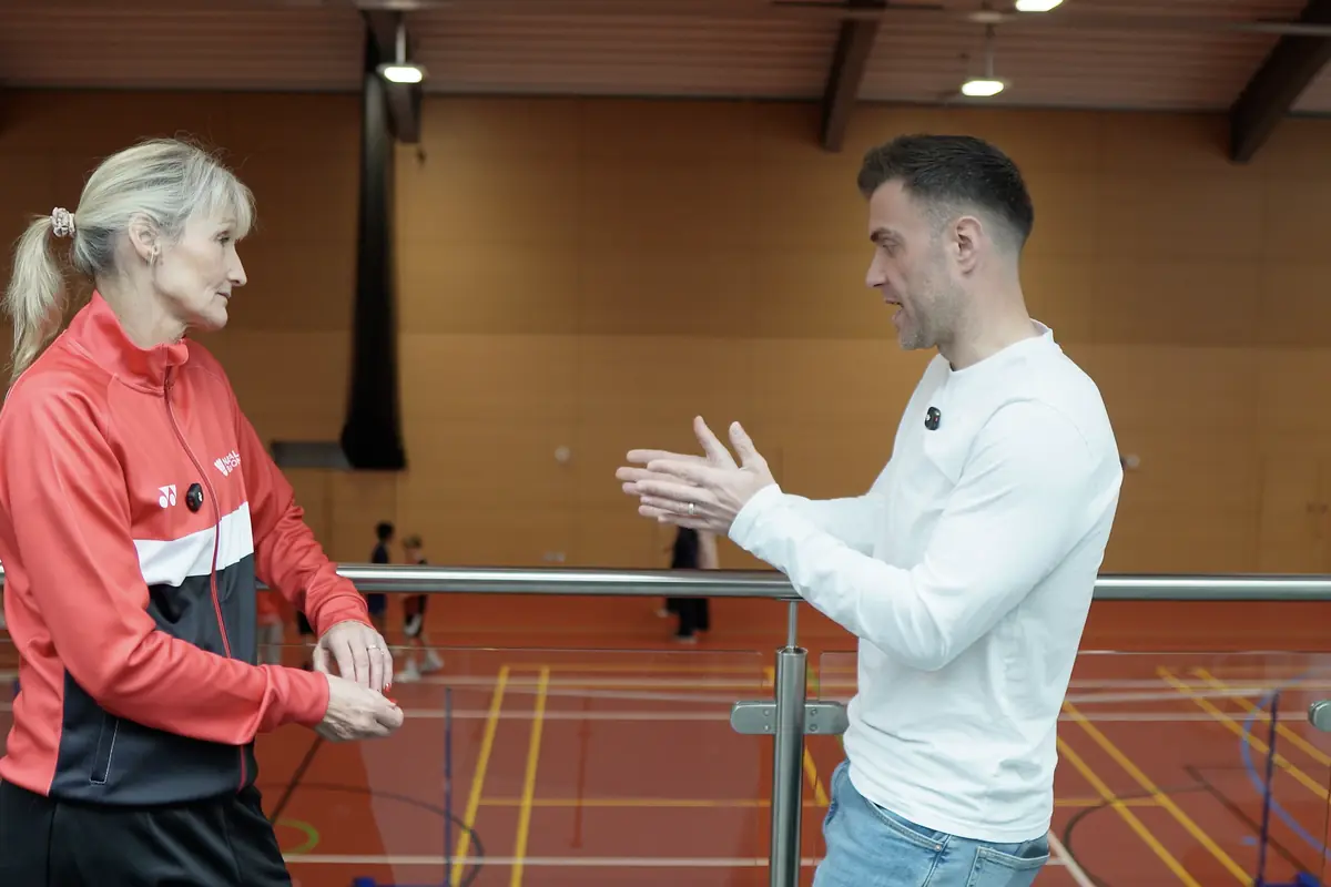Ed and Julie Bradbury in conversation above the courts