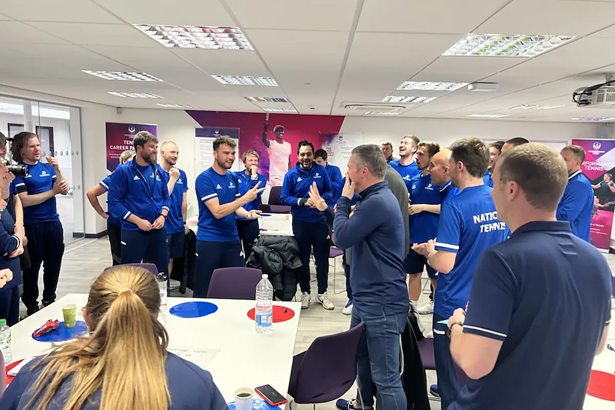 National Tennis coaches gathered in a training room