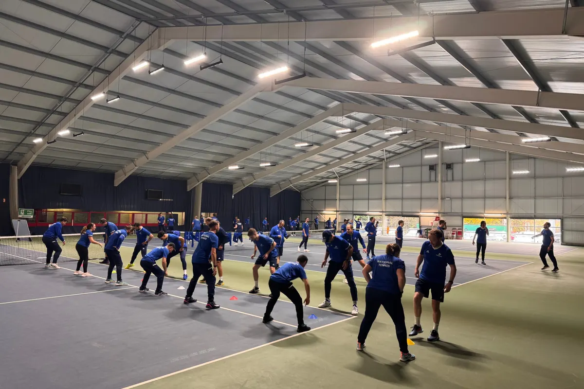 National Tennis coaches warming up together at Stafford Manor