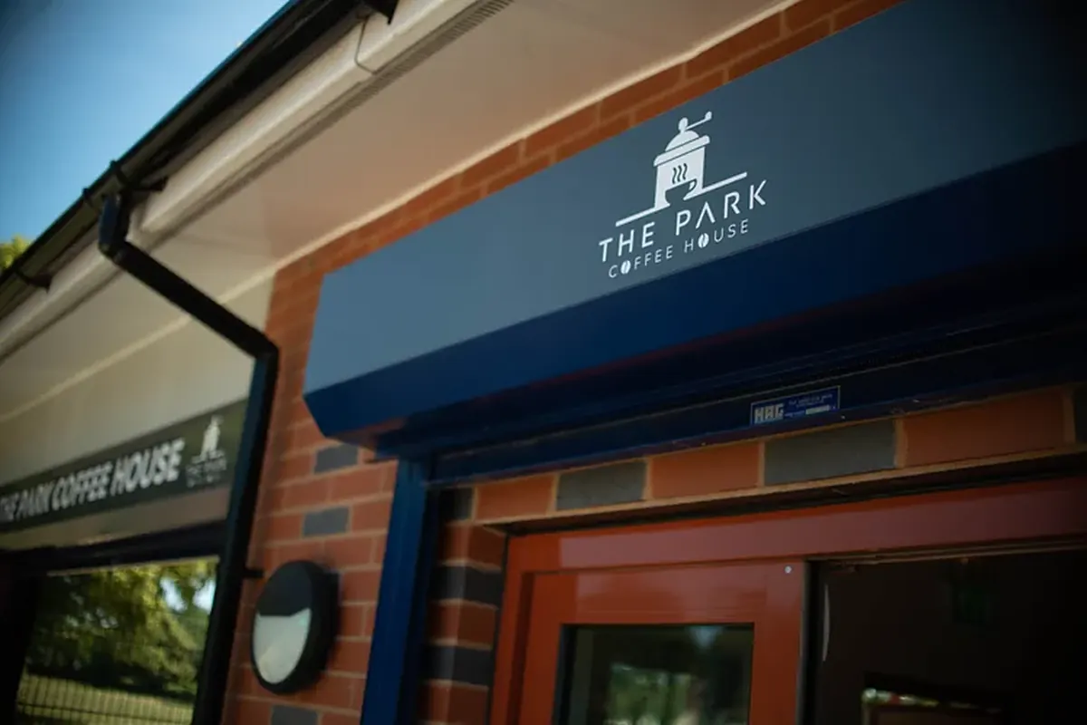The Park Coffee House sign above the café door